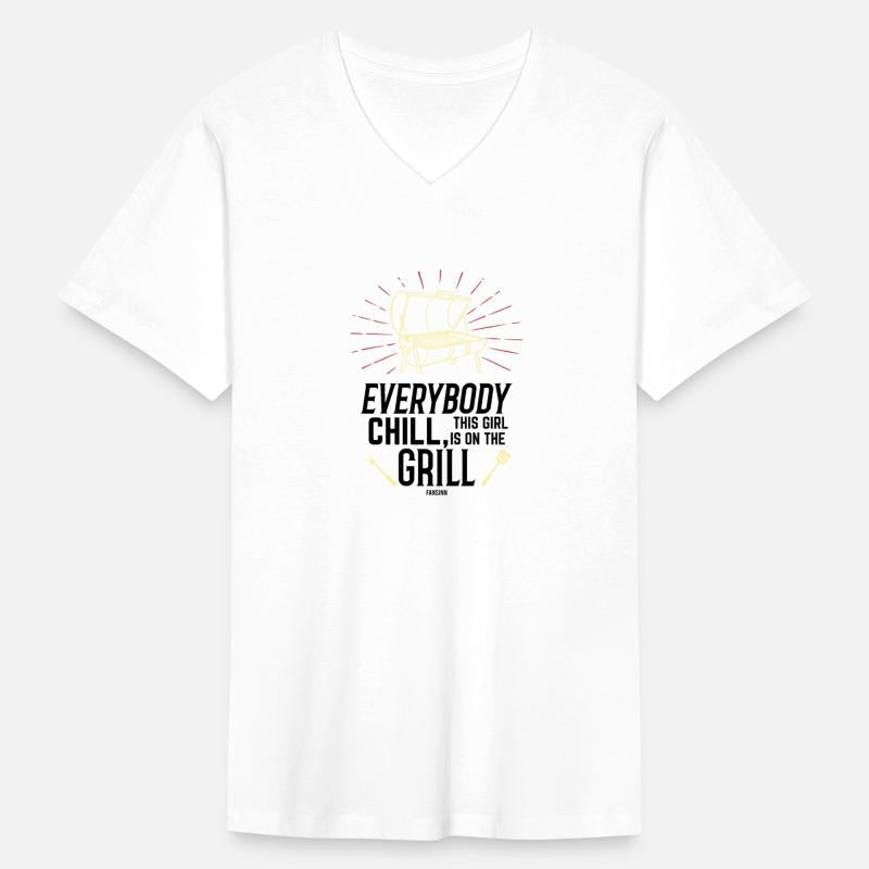 Woman is standing at the grill